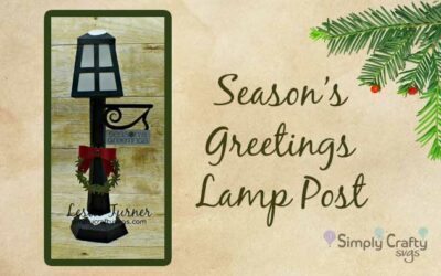 Seasons Greetings Lamp Post by DT Leslie